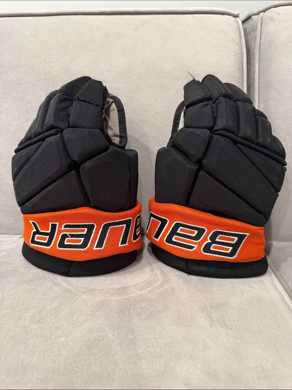 Bauer Black Hockey Gloves with Orange Cuff